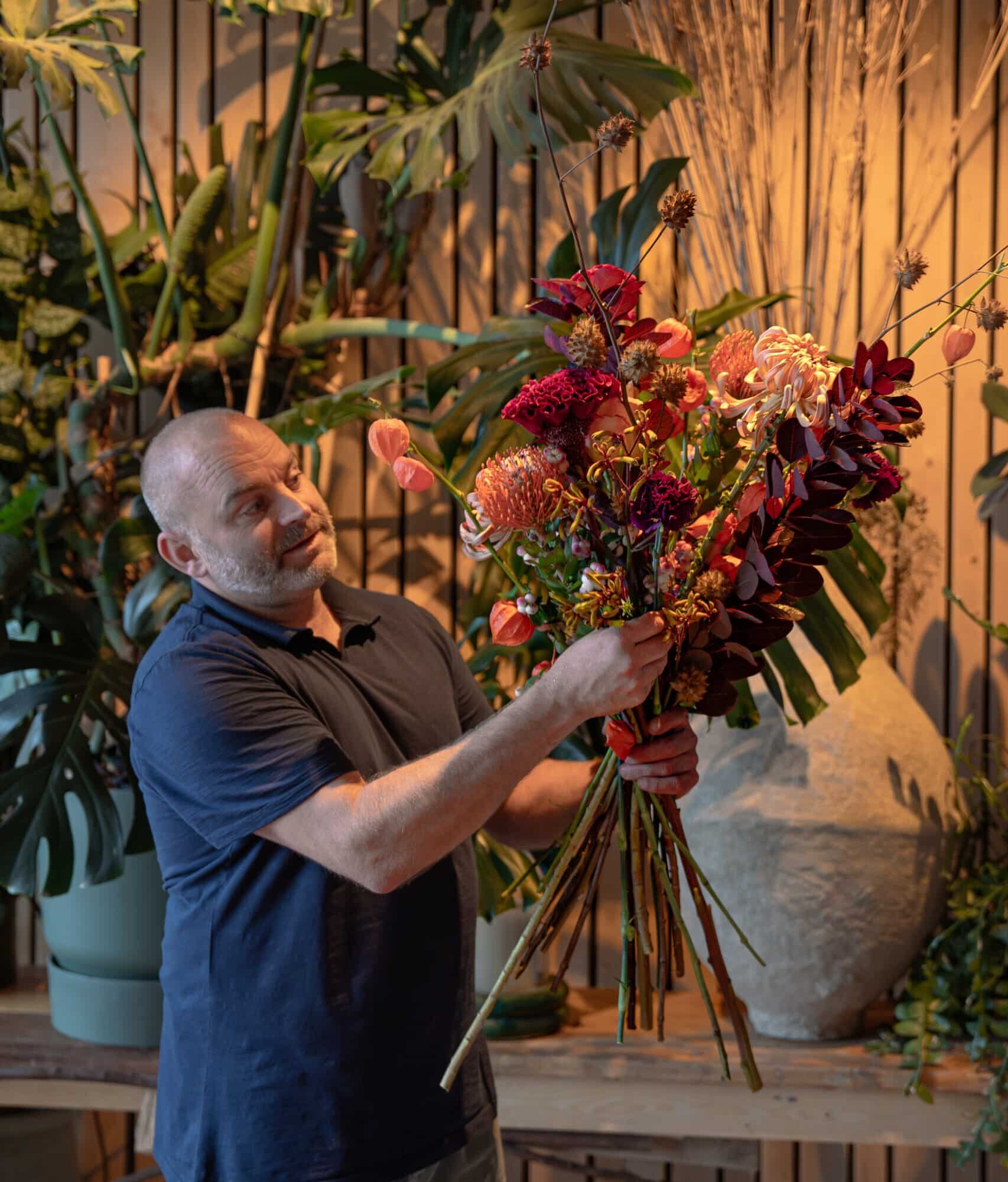 Burgundy red flowers in an autumn bouquet for florists